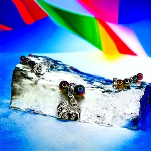 Floating beaded and elephant charm, earrings set